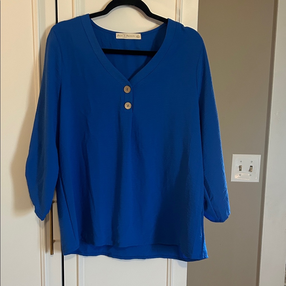 Elegant Blue V-Neck Blouse with Button Detail